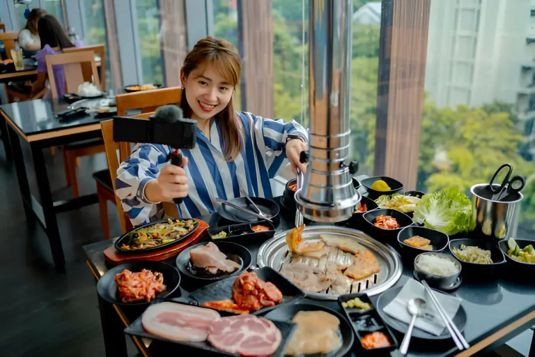 Girl taking a picture of her food